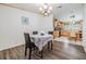 Cozy dining area featuring tile floors, open layout with kitchen, and natural light at 36731 Tara Ave, Zephyrhills, FL 33542
