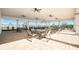 The community clubhouse features tables and chairs for gathering and socializing with neighbors at 37820 Beacon Brick Dr, Zephyrhills, FL 33540