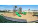 Community playground featuring a slide, climbing structures, and a swing set for outdoor fun at 37820 Beacon Brick Dr, Zephyrhills, FL 33540