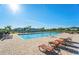 Enjoy the community pool with ample deck space and plenty of lounge chairs for relaxing at 37820 Beacon Brick Dr, Zephyrhills, FL 33540
