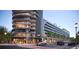 Architecturally striking exterior of a modern condo building with unique curved balconies and stylish design at 400 Central Ave # 2705, St Petersburg, FL 33701