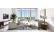 Stylish living room with floor-to-ceiling windows offering panoramic views and sophisticated decor at 400 Central Ave # 2705, St Petersburg, FL 33701