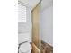 Bathroom features a toilet and standing shower with industrial shower curtain at 410 N Corona Ave, Clearwater, FL 33765