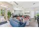 Bright community room with neutral walls, seating, and hardwood floors at 4151 Little Gap Loop, Ellenton, FL 34222