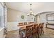 Spacious dining area is decorated with custom trim and crown molding at 4151 Little Gap Loop, Ellenton, FL 34222