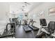 Community gym with treadmills, weight machines, and plenty of natural light at 4151 Little Gap Loop, Ellenton, FL 34222