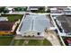 Aerial view of a house with a fenced yard and a well-maintained roof at 4403 W Minnehaha St, Tampa, FL 33614