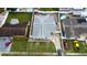 Aerial shot of home featuring fenced yard, shed, and driveway with parking at 4403 W Minnehaha St, Tampa, FL 33614
