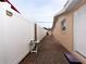 Exterior side view of house and brick paver pathway featuring a privacy fence at 4403 W Minnehaha St, Tampa, FL 33614