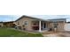 Inviting single-story home featuring a quaint porch and manicured front yard at 4403 W Minnehaha St, Tampa, FL 33614