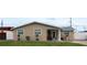 Lovely single-story home with a welcoming porch and colorful potted plants at 4403 W Minnehaha St, Tampa, FL 33614