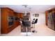 Open kitchen design with breakfast bar, modern cabinets, and stainless-steel appliances at 4403 W Minnehaha St, Tampa, FL 33614