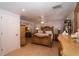 Bedroom showcasing a carved wooden bed frame with coordinating dresser and mirrored closet at 4403 W Minnehaha St, Tampa, FL 33614
