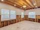 Bedroom with natural light, exposed framing, and spacious design, awaiting personalized touches at 4419 W El Prado Blvd, Tampa, FL 33629