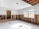 Bright living area with a large window, awaiting renovation and personalization to your taste at 4419 W El Prado Blvd, Tampa, FL 33629