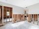 Spacious living room featuring exposed framing and potential for customization at 4419 W El Prado Blvd, Tampa, FL 33629