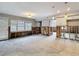 Open living area with bay window, offering great potential for renovation and customization at 4419 W El Prado Blvd, Tampa, FL 33629