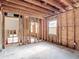 Exposed framing and structure of a room, showing a clear look at the space ready for a new design at 4419 W El Prado Blvd, Tampa, FL 33629