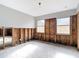 Bright room with exposed wall frames and windows ready for remodel, offering a clear vision for renovation at 4419 W El Prado Blvd, Tampa, FL 33629