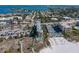 Aerial view shows condo, beach access, beach amenities and gulf views at 4510 Gulf Blvd # 604, St Pete Beach, FL 33706