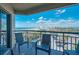 Relax and enjoy city and beach views from this balcony with seating for four at 4510 Gulf Blvd # 604, St Pete Beach, FL 33706