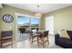 Open dining room area leads to outdoor patio and beautiful gulf views at 4510 Gulf Blvd # 604, St Pete Beach, FL 33706