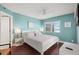 The main bedroom offers a serene retreat with beach views, wood floors, and two bedside tables at 4510 Gulf Blvd # 604, St Pete Beach, FL 33706