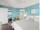 This main bedroom features a closet with mirrored doors, a seating area, and access to the bathroom at 4510 Gulf Blvd # 604, St Pete Beach, FL 33706