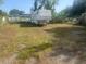 Spacious backyard with an recreational vehicle at 5211 E 17Th Ave, Tampa, FL 33619