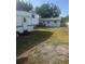 Backyard with a shed in the background at 5211 E 17Th Ave, Tampa, FL 33619