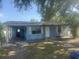 Charming single-Gathering home featuring an attached carport and covered front entrance at 5211 E 17Th Ave, Tampa, FL 33619