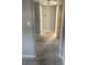 Tile hallway leading to multiple rooms within the house at 5211 E 17Th Ave, Tampa, FL 33619