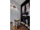 Walk-in closet with built-in shelving, ample storage, and a stool at 5700 Pacific N St, St Petersburg, FL 33703