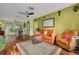 Spacious living room with hardwood floors and adjacent dining area at 5700 Pacific N St, St Petersburg, FL 33703
