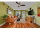 Comfortable living room features hardwood floors and large front window at 5700 Pacific N St, St Petersburg, FL 33703