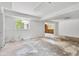 Large basement space with window and access to the living area at 605 Ronele Dr, Brandon, FL 33511