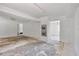 Open basement area featuring built-in ovens and access to other rooms at 605 Ronele Dr, Brandon, FL 33511