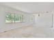 Spacious living room with large windows providing ample natural light at 605 Ronele Dr, Brandon, FL 33511