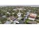 Aerial view of the neighborhood showcasing waterfront homes, canals, and lush greenery at 648 Geneva Pl, Tampa, FL 33606