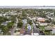 Aerial view of a charming neighborhood with mature trees, waterfront properties, and a view of the bay at 648 Geneva Pl, Tampa, FL 33606