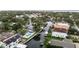 Aerial perspective features a collection of waterfront residences nestled along a tranquil canal at 648 Geneva Pl, Tampa, FL 33606