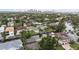 Scenic aerial view of houses with waterway access surrounded by lush greenery, close to the city at 648 Geneva Pl, Tampa, FL 33606