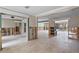 Spacious living room with tile floors, open concept design, and a neutral color palette perfect for customization at 648 Geneva Pl, Tampa, FL 33606