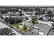 A beautiful aerial view of the home's backyard featuring a fence and inground pool at 6509 W Longboat Blvd, Tampa, FL 33615