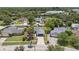 Aerial view of the home showing location, neighborhood, and mature trees at 6509 W Longboat Blvd, Tampa, FL 33615