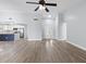 Bright and open living space featuring modern finishes, recessed lighting, and an adjoining kitchen area at 6509 W Longboat Blvd, Tampa, FL 33615