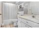 The bathroom has a shower-tub combination and a single sink vanity with storage at 6801 Summer Cove Dr, Riverview, FL 33578