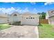 Charming one-story home featuring a well-maintained lawn and attached two-car garage at 6801 Summer Cove Dr, Riverview, FL 33578