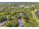 An aerial view showing the property backing up to a canal and greenway at 6807 River Rd, Tampa, FL 33615