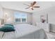 Bright primary bedroom with water view and large window, offering natural light and ample space at 7916 Evergreen Creek Ct, Riverview, FL 33578